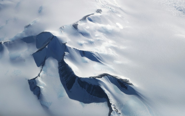 Hidden world: Scientists have found a landscape of plunging valleys and sharply peaked hills far below the Antarctic ice